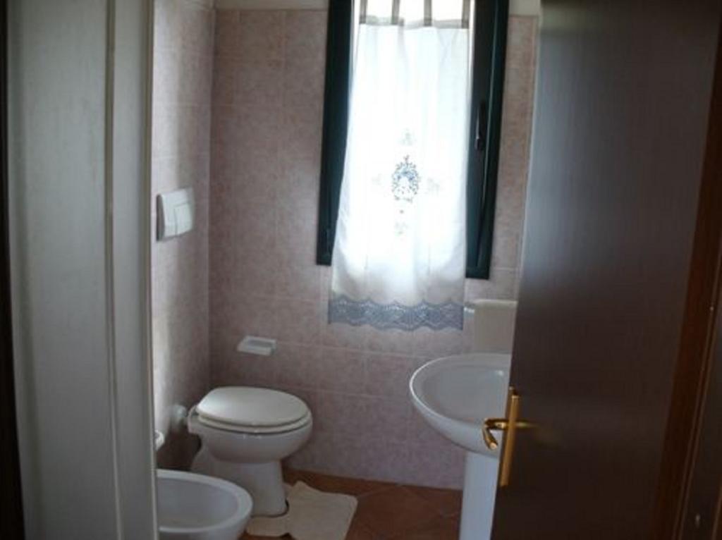Farm Stay Gli Oleandri Loiri Porto San Paolo Værelse billede